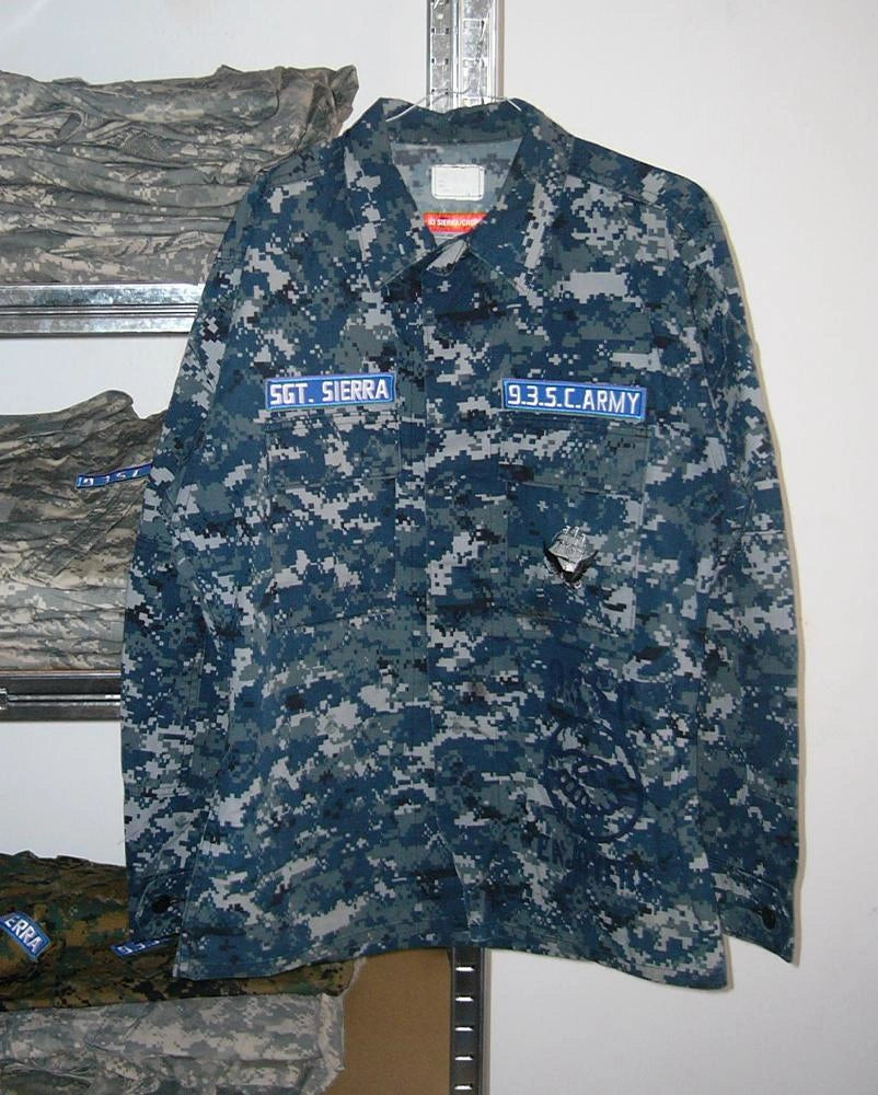Navy Army Jacket reworked in our atelier. Upcycling. 93 sierra crosses