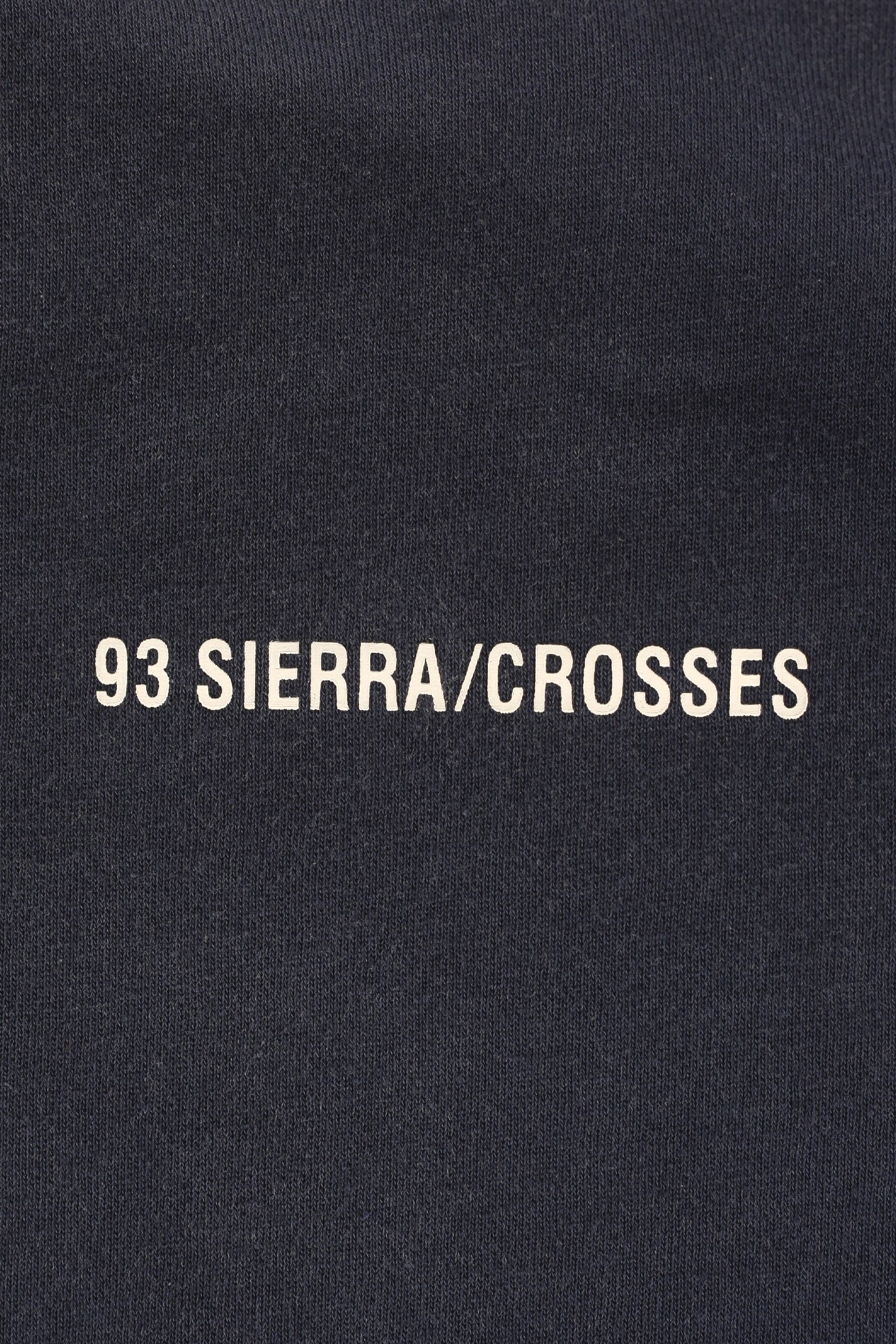 93 SIERRA/CROSSES white screenprint logo on navy blue crewneck close view