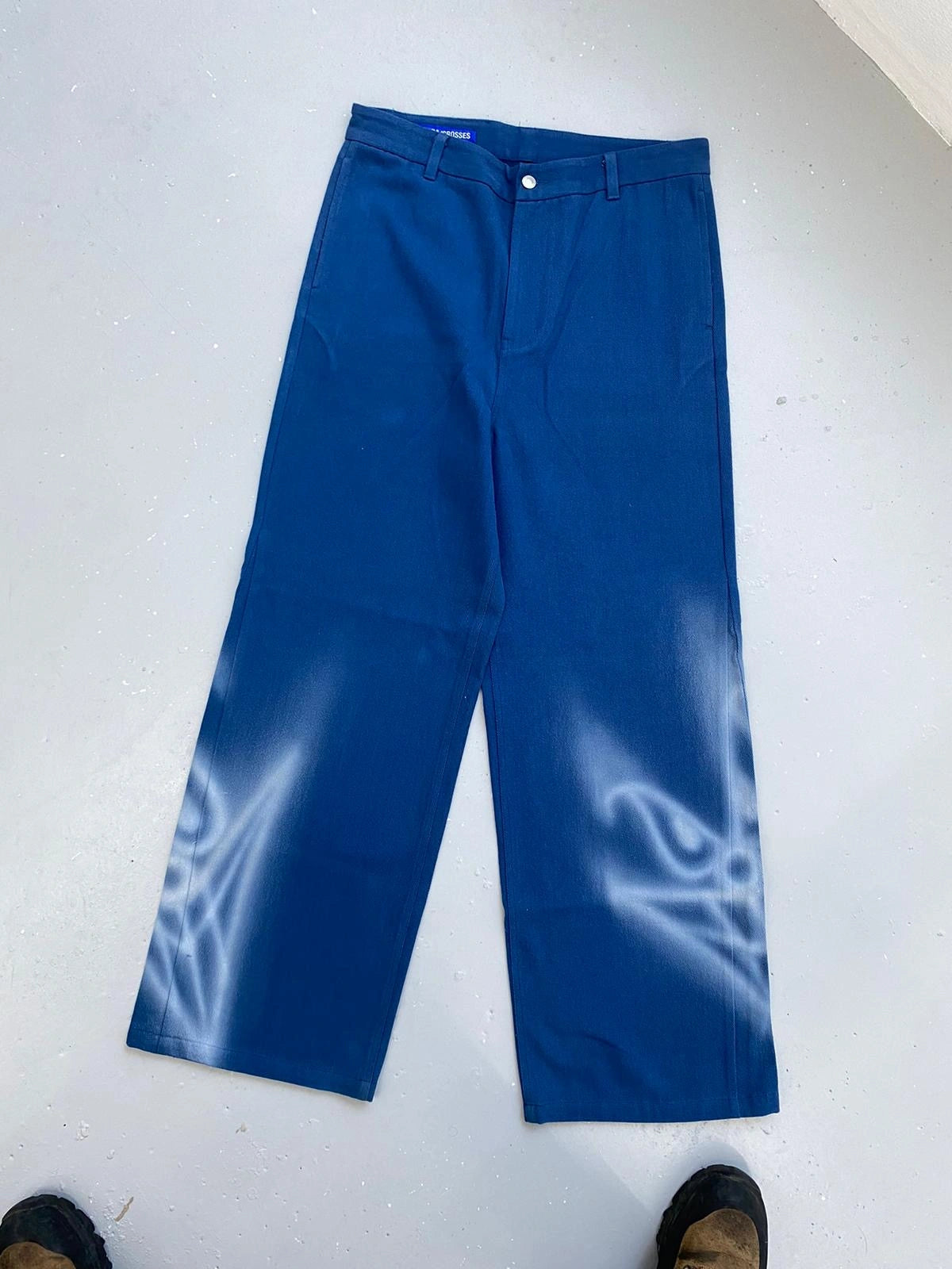 Airbrush painted custom work pants by Kevin Mejia