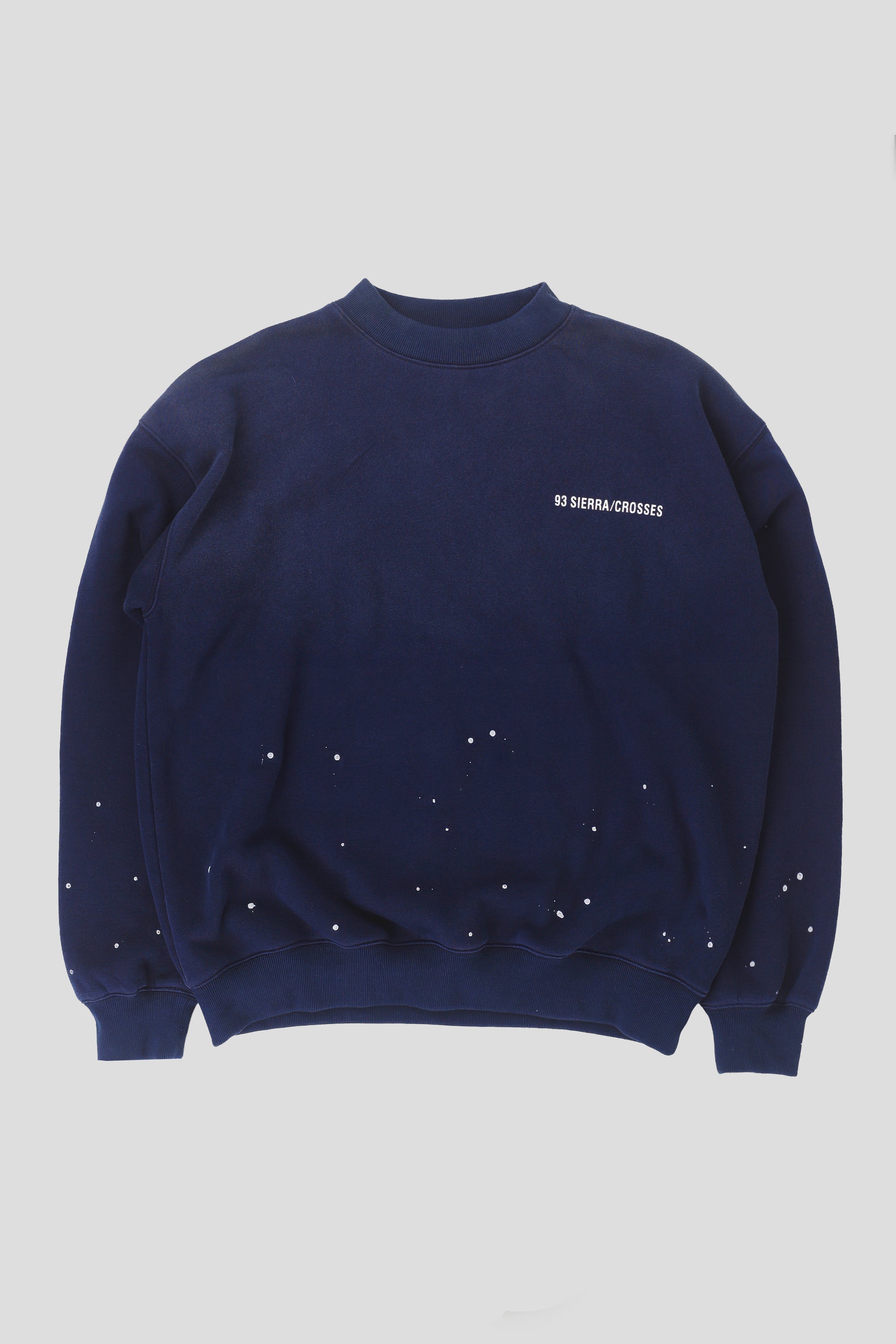 Splattered paint effect navy blue crewneck 93 sierra crosses logo front view