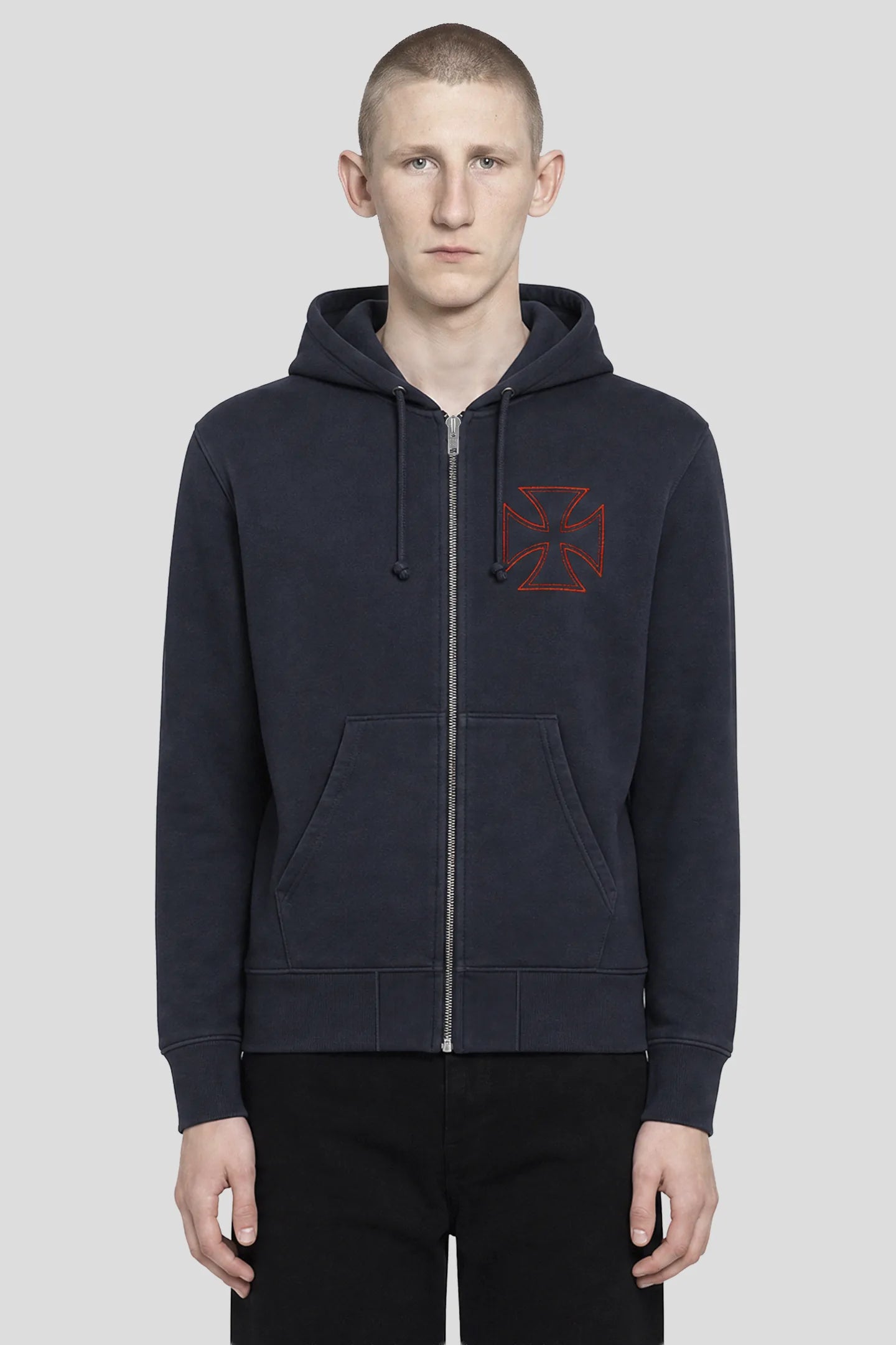 Model wearing the Cross Navy Zip Hoodie with red cross chest embroidery, front view 93 SIERRA/CROSSES